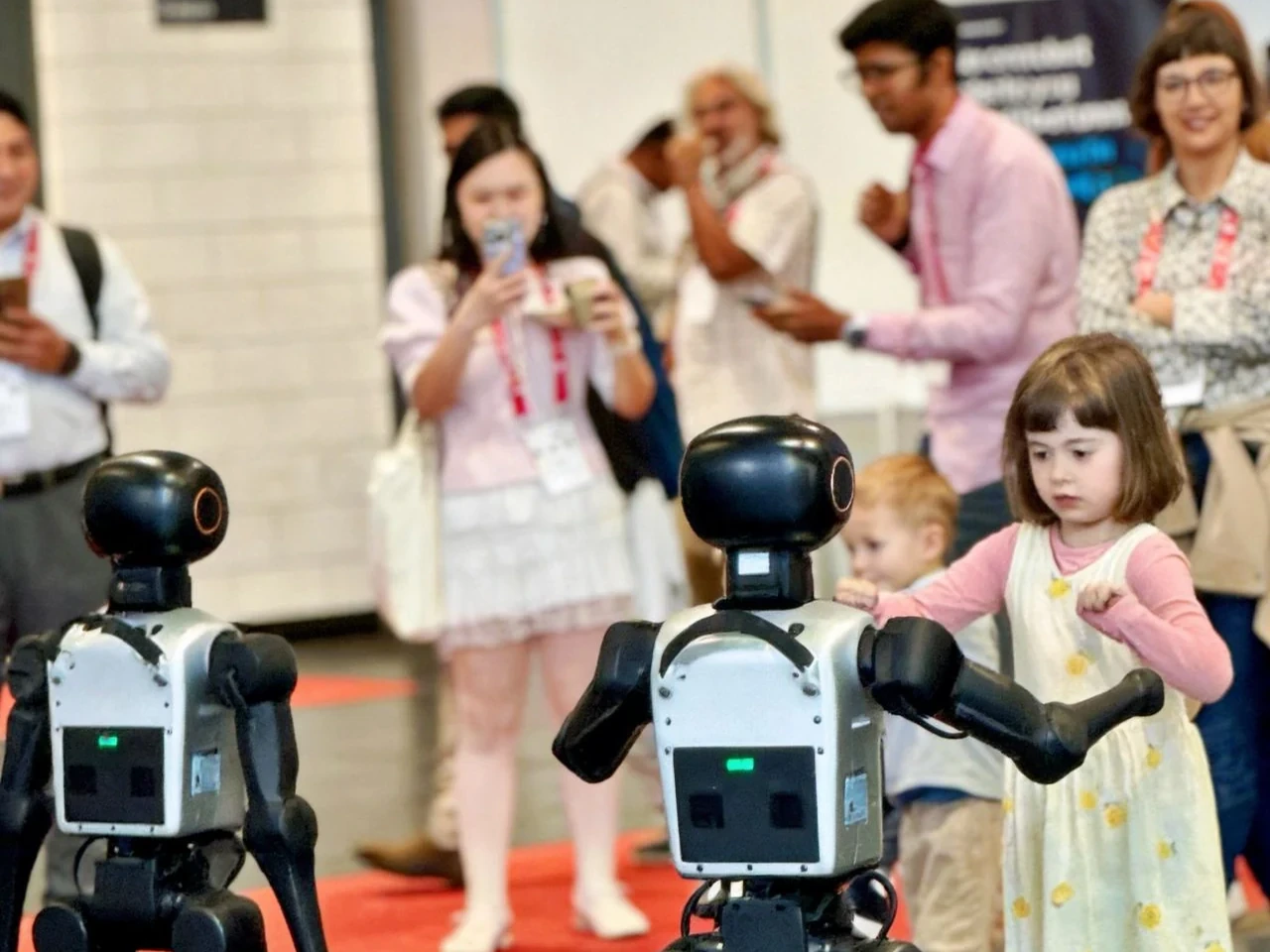 Booster K1 · meeting children